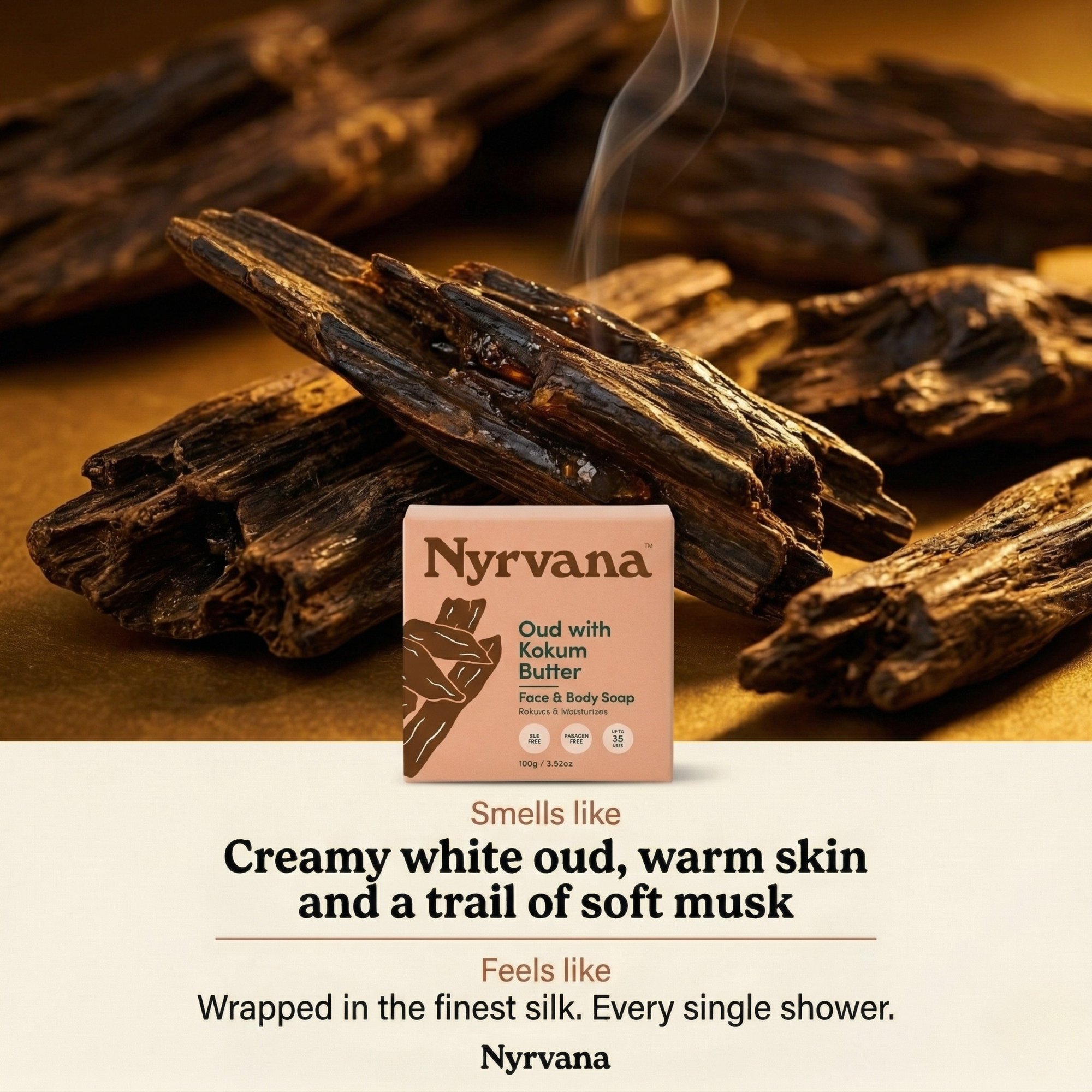 Nyrvana Oud Kokum Butter Soap box resting on dark oud wood pieces with smoke rising and warm golden background