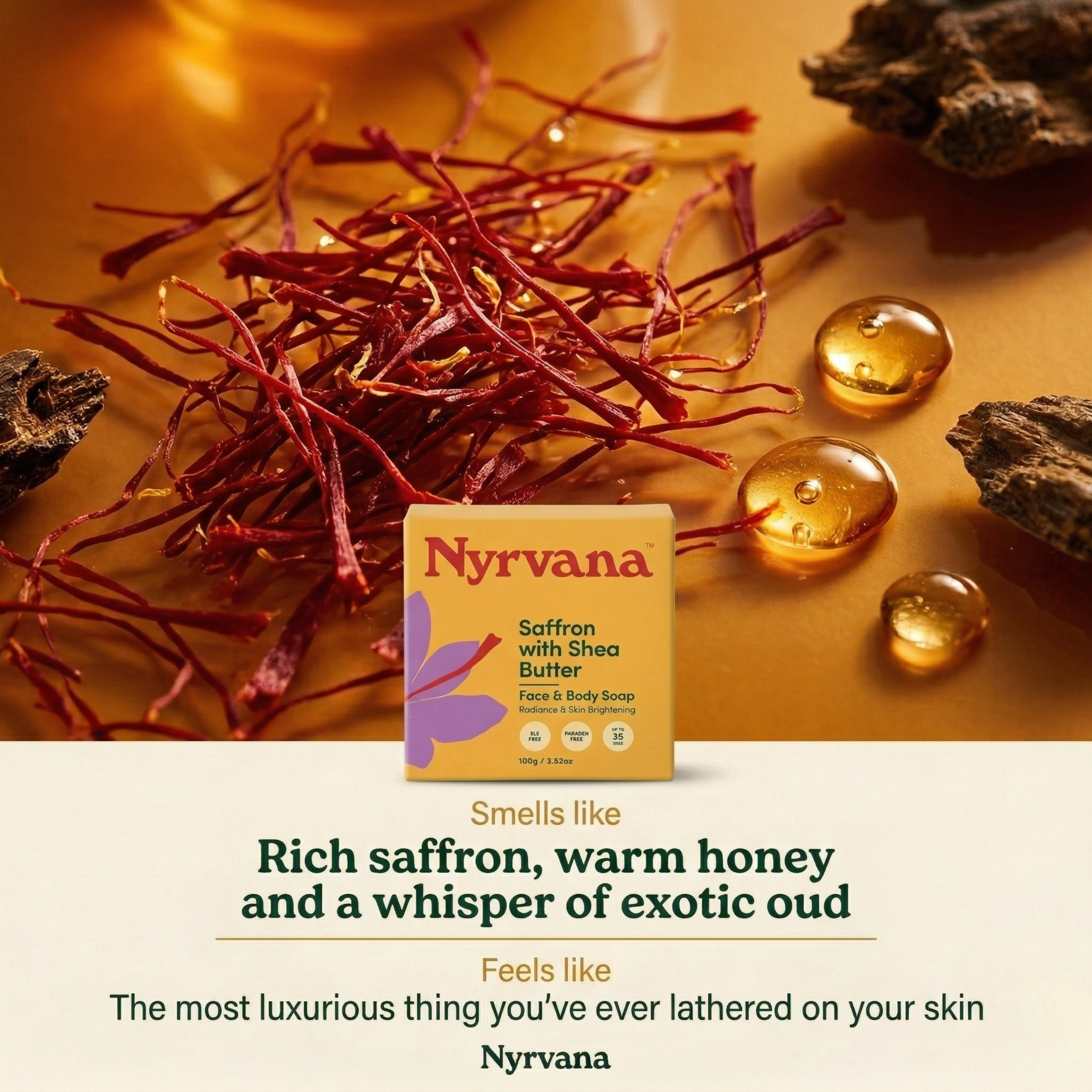 Nyrvana Saffron Shea Butter Soap box on golden surface surrounded by rich red saffron threads and amber oil droplets