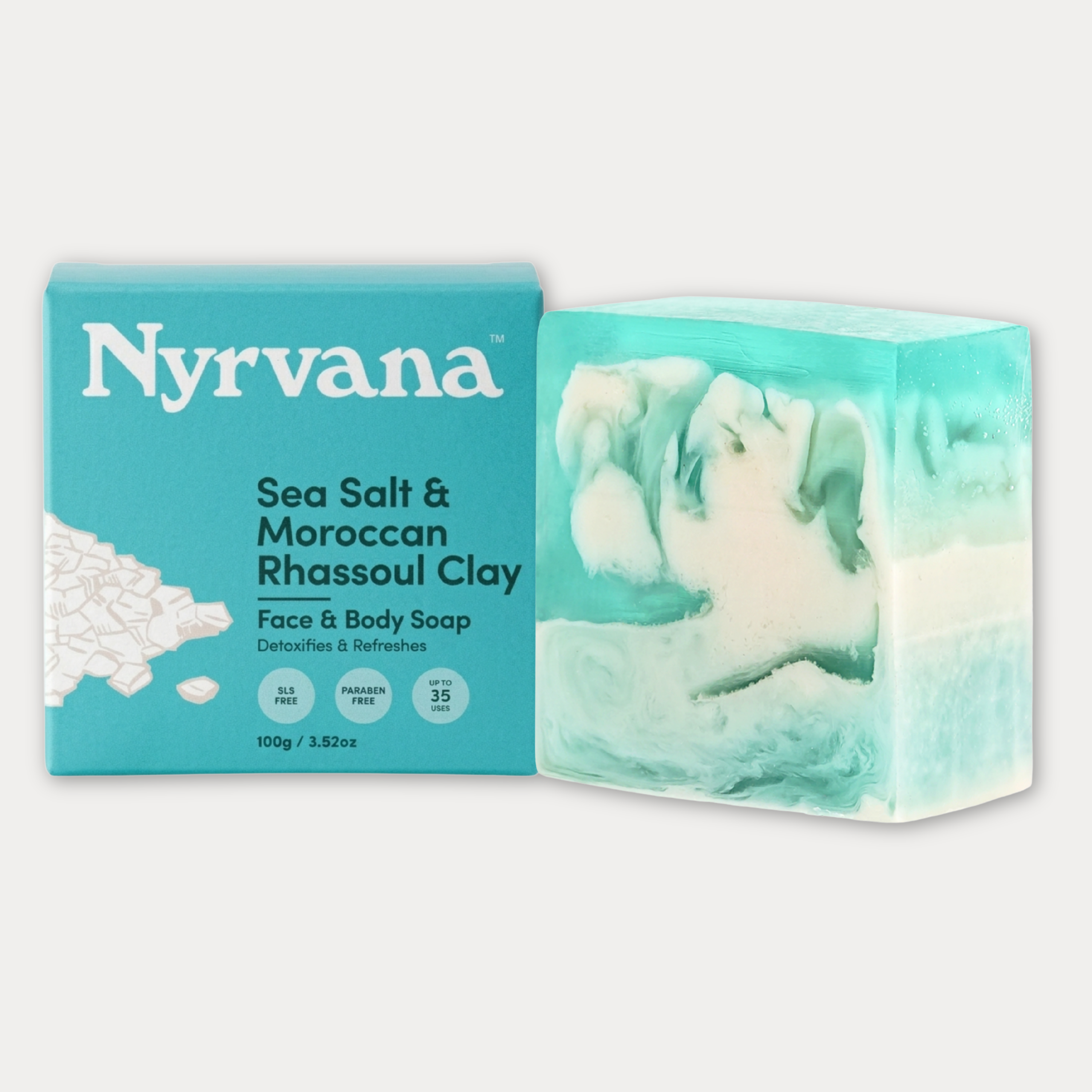 Nyrvana Sea Salt and Moroccan Rhassoul Clay Face and Body Soap 100g with teal box and teal white swirl bar on white background
